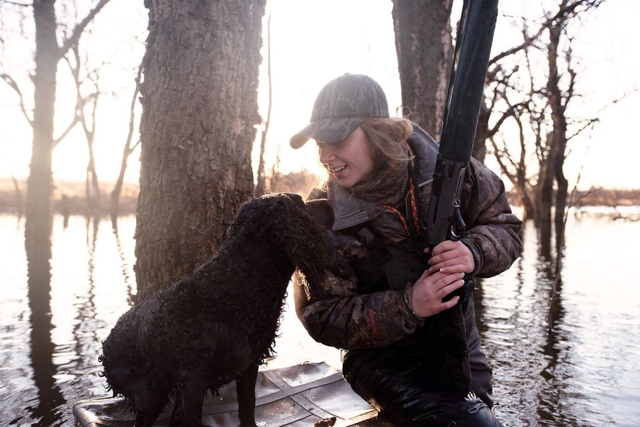 Hannah Criscoe of Whistling Wings Kennel with her Boykin Spaniel